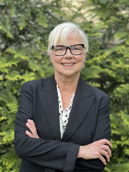 environmental photo of Alice W. Hunt wearing black jacket